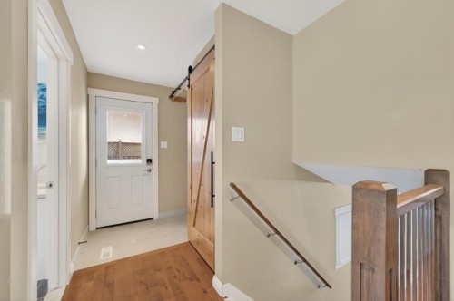 8 Slocan Road Sw, Calgary, AB - Indoor Photo Showing Other Room