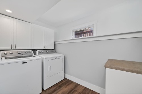 8 Slocan Road Sw, Calgary, AB - Indoor Photo Showing Laundry Room