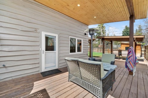 8 Slocan Road Sw, Calgary, AB - Outdoor With Deck Patio Veranda With Exterior