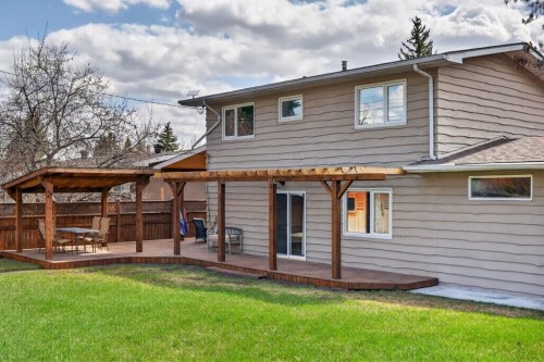 8 Slocan Road Sw, Calgary, AB - Outdoor With Deck Patio Veranda