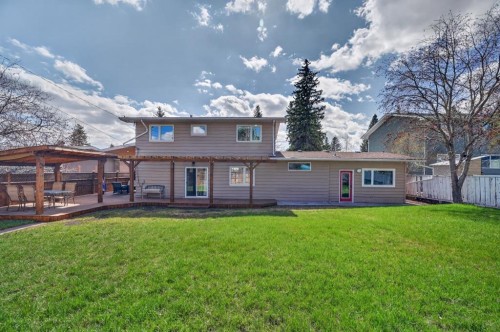 8 Slocan Road Sw, Calgary, AB - Outdoor With Deck Patio Veranda