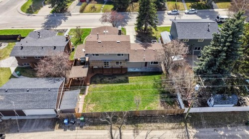 8 Slocan Road Sw, Calgary, AB - Outdoor With Deck Patio Veranda