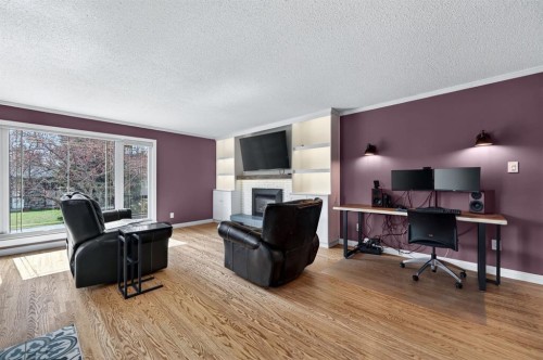 8 Slocan Road Sw, Calgary, AB - Indoor Photo Showing Other Room