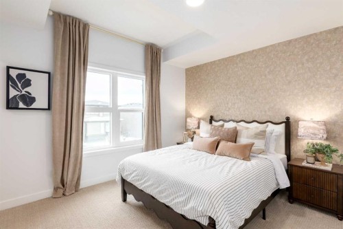 107 Osprey Hill Point Sw, Calgary, AB - Indoor Photo Showing Bedroom