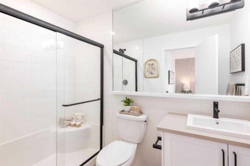 107 Osprey Hill Point Sw, Calgary, AB - Indoor Photo Showing Bathroom