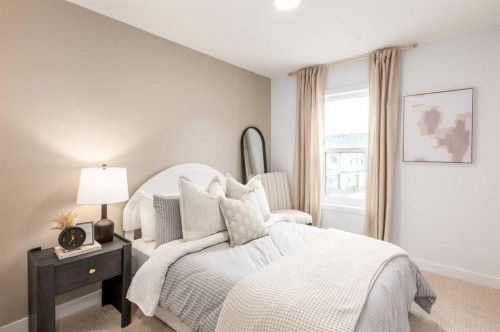107 Osprey Hill Point Sw, Calgary, AB - Indoor Photo Showing Bedroom