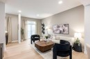 107 Osprey Hill Point Sw, Calgary, AB  - Indoor Photo Showing Living Room 