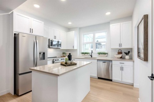 107 Osprey Hill Point Sw, Calgary, AB - Indoor Photo Showing Kitchen With Upgraded Kitchen