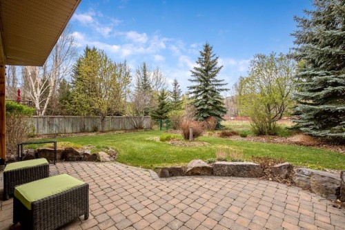 120 Bow Meadows Drive, Cochrane, AB - Outdoor With Backyard