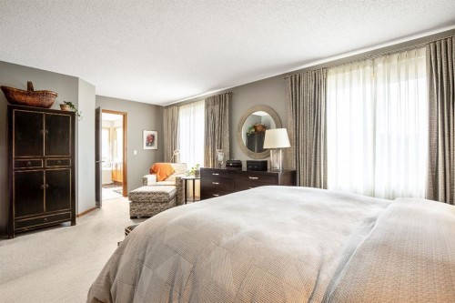120 Bow Meadows Drive, Cochrane, AB - Indoor Photo Showing Bedroom