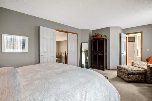 120 Bow Meadows Drive, Cochrane, AB - Indoor Photo Showing Bedroom