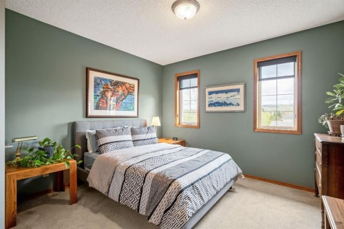 120 Bow Meadows Drive, Cochrane, AB - Indoor Photo Showing Bedroom