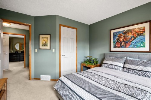 120 Bow Meadows Drive, Cochrane, AB - Indoor Photo Showing Bedroom