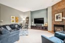 120 Bow Meadows Drive, Cochrane, AB  - Indoor Photo Showing Living Room With Fireplace 
