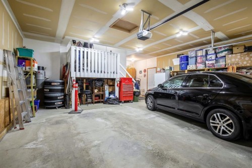 120 Bow Meadows Drive, Cochrane, AB - Indoor Photo Showing Garage