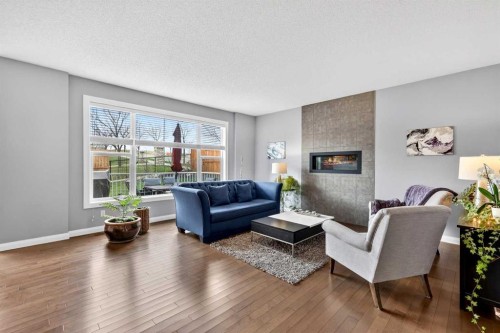 41 Westridge Road, Okotoks, AB - Indoor Photo Showing Living Room With Fireplace