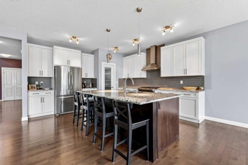 41 Westridge Road, Okotoks, AB - Indoor Photo Showing Kitchen With Upgraded Kitchen