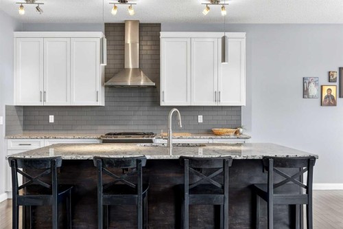 41 Westridge Road, Okotoks, AB - Indoor Photo Showing Kitchen With Upgraded Kitchen