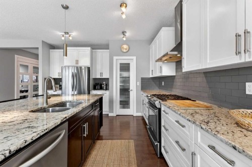 41 Westridge Road, Okotoks, AB - Indoor Photo Showing Kitchen With Double Sink With Upgraded Kitchen