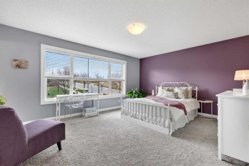 41 Westridge Road, Okotoks, AB - Indoor Photo Showing Bedroom