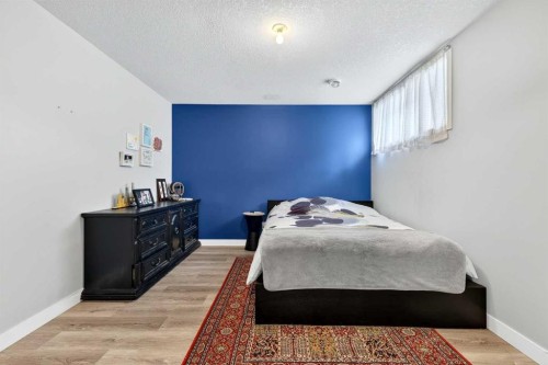 41 Westridge Road, Okotoks, AB - Indoor Photo Showing Bedroom