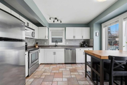 450 Regal Park Ne, Calgary, AB - Indoor Photo Showing Kitchen With Stainless Steel Kitchen