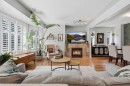 450 Regal Park Ne, Calgary, AB  - Indoor Photo Showing Living Room With Fireplace 