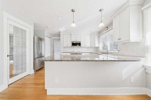 1728 Lake Bonavista Drive Se, Calgary, AB - Indoor Photo Showing Kitchen With Upgraded Kitchen