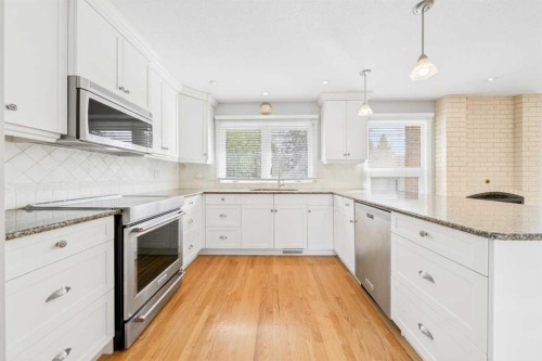 1728 Lake Bonavista Drive Se, Calgary, AB - Indoor Photo Showing Kitchen With Upgraded Kitchen