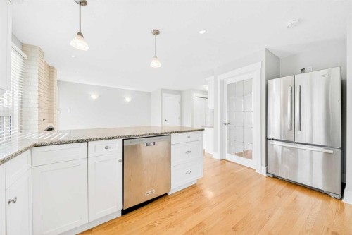 1728 Lake Bonavista Drive Se, Calgary, AB - Indoor Photo Showing Kitchen
