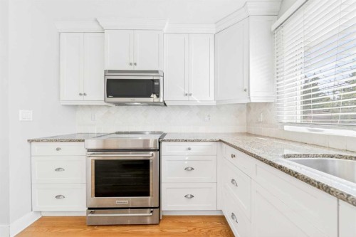 1728 Lake Bonavista Drive Se, Calgary, AB - Indoor Photo Showing Kitchen