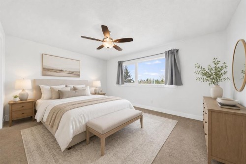 1728 Lake Bonavista Drive Se, Calgary, AB - Indoor Photo Showing Bedroom