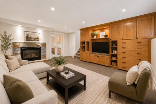 1728 Lake Bonavista Drive Se, Calgary, AB - Indoor Photo Showing Living Room With Fireplace