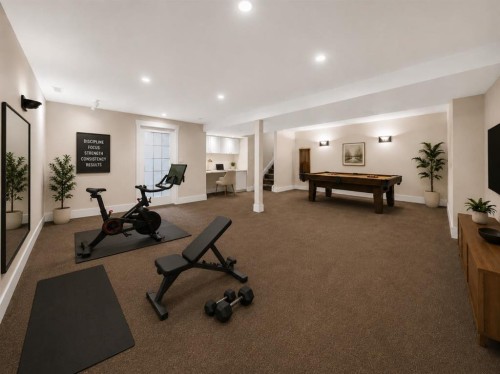 1728 Lake Bonavista Drive Se, Calgary, AB - Indoor Photo Showing Gym Room