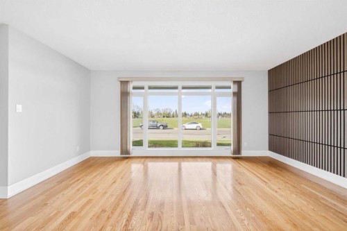 1728 Lake Bonavista Drive Se, Calgary, AB - Indoor Photo Showing Other Room