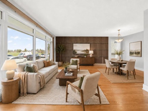 1728 Lake Bonavista Drive Se, Calgary, AB - Indoor Photo Showing Living Room