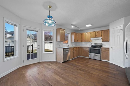 182 Coventry Close Ne, Calgary, AB - Indoor Photo Showing Kitchen With Double Sink
