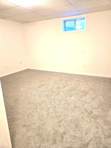 182 Coventry Close Ne, Calgary, AB - Indoor Photo Showing Other Room