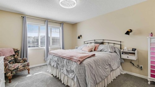 36 New Brighton Landing Se, Calgary, AB - Indoor Photo Showing Bedroom