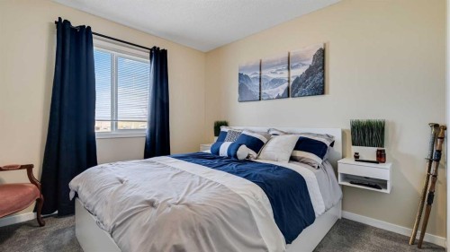 36 New Brighton Landing Se, Calgary, AB - Indoor Photo Showing Bedroom