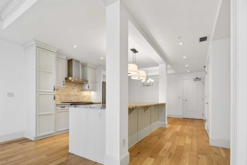 305-221 Quarry Way Se, Calgary, AB - Indoor Photo Showing Kitchen