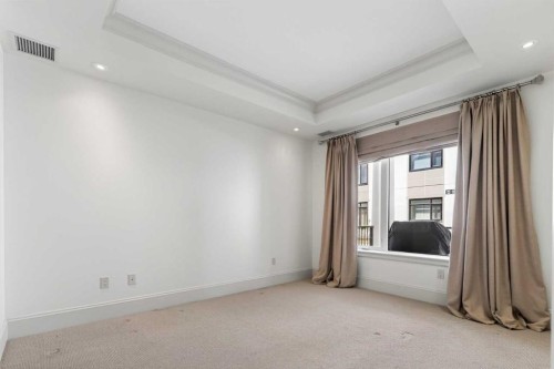 305-221 Quarry Way Se, Calgary, AB - Indoor Photo Showing Other Room