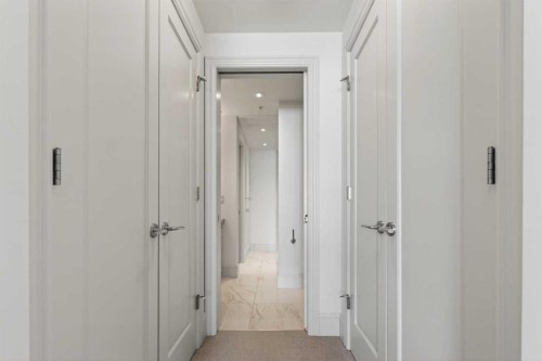 305-221 Quarry Way Se, Calgary, AB - Indoor Photo Showing Other Room