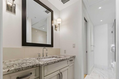305-221 Quarry Way Se, Calgary, AB - Indoor Photo Showing Bathroom