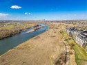 305-221 Quarry Way Se, Calgary, AB  - Outdoor With Body Of Water With View 