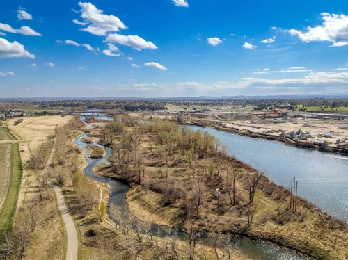 305-221 Quarry Way Se, Calgary, AB - Outdoor With Body Of Water With View