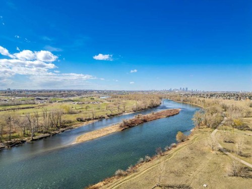 305-221 Quarry Way Se, Calgary, AB - Outdoor With Body Of Water With View