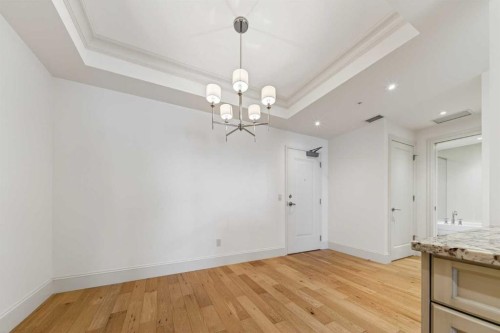 305-221 Quarry Way Se, Calgary, AB - Indoor Photo Showing Other Room