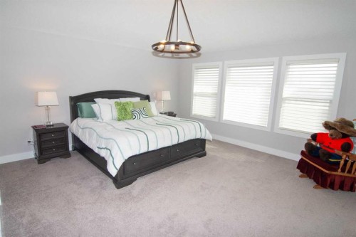 237 Kinniburgh Way, Chestermere, AB - Indoor Photo Showing Bedroom