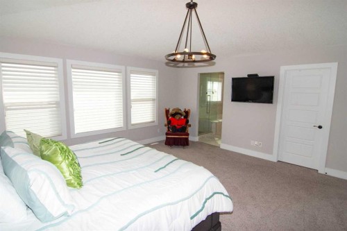 237 Kinniburgh Way, Chestermere, AB - Indoor Photo Showing Bedroom